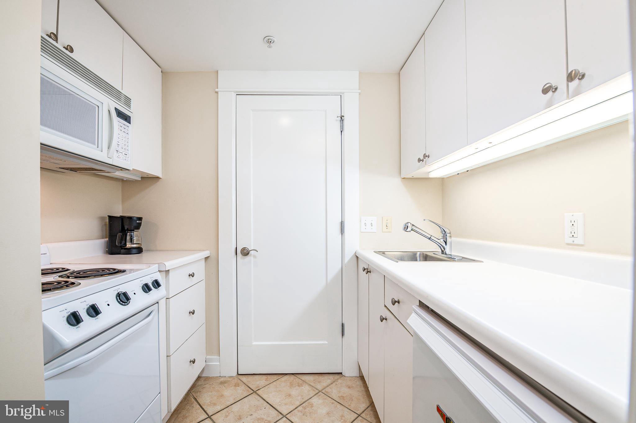 5809 Sherier Place Northwest Washington, DC 20016 - Photo 32 of 48 Lower level kitchenette