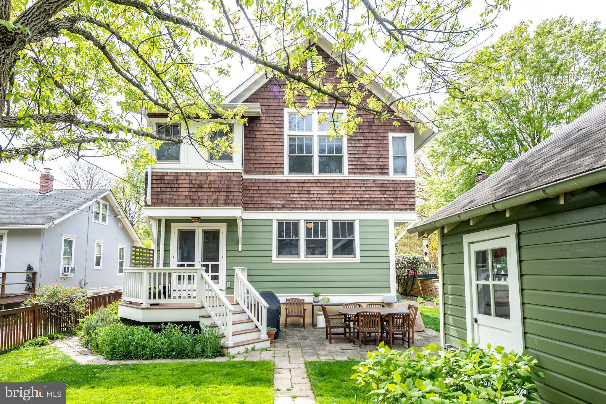 5809 Sherier Place Northwest Washington, DC 20016 - Photo 35 of 48 Rear view with deck and kpatio