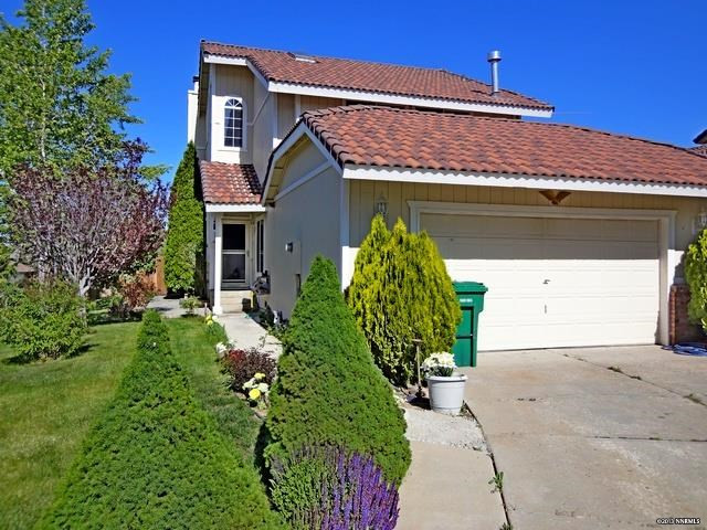 7110 Indigo Circle Reno, NV 89506 - Photo 1 of 1 a front view of a house with garden