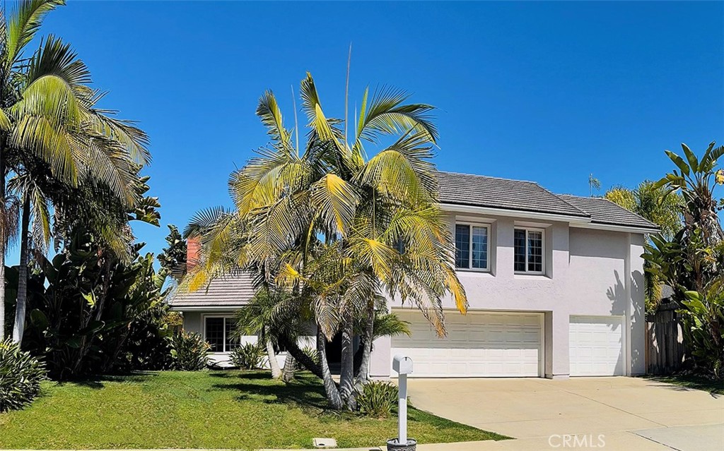 2204 Recodo Court Carlsbad, CA 92009 - Photo 1 of 44 a front view of a house with garden