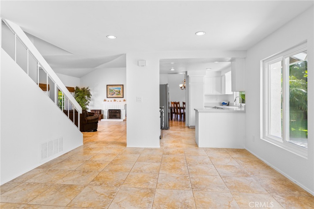 2204 Recodo Court Carlsbad, CA 92009 - Photo 16 of 44 a view of a hallway with furniture and a large window