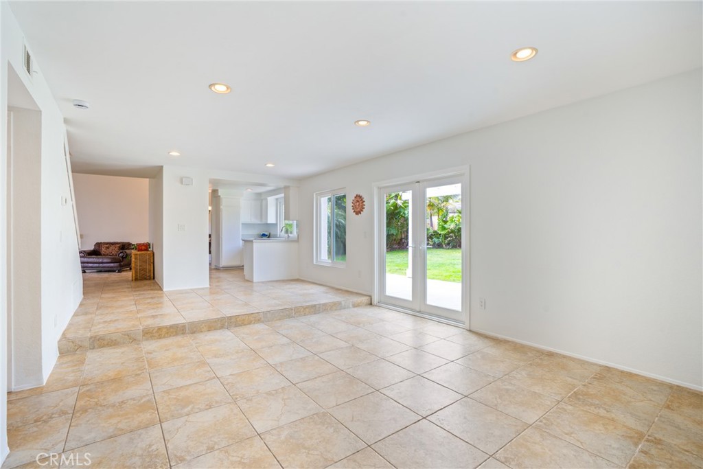 2204 Recodo Court Carlsbad, CA 92009 - Photo 17 of 44 a view of an empty room and a kitchen