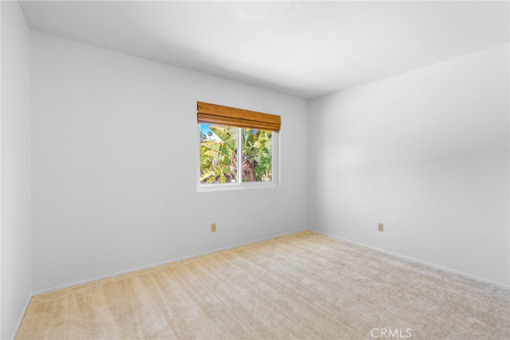 2204 Recodo Court Carlsbad, CA 92009 - Photo 24 of 44 an empty room with a window