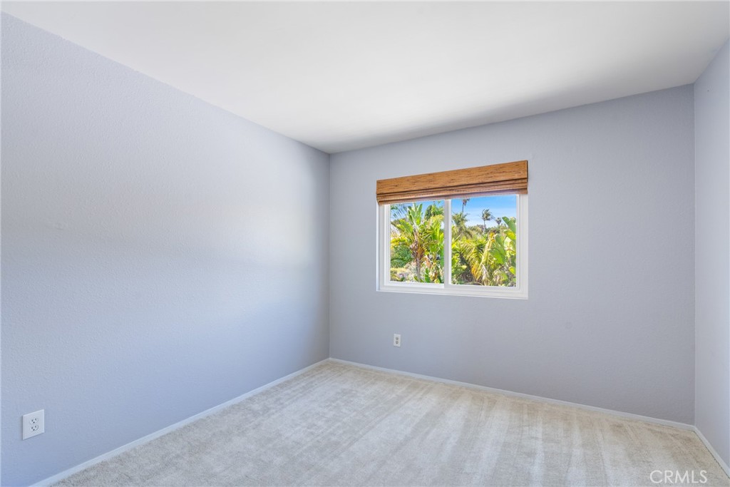 2204 Recodo Court Carlsbad, CA 92009 - Photo 25 of 44 a view of an empty room with a window