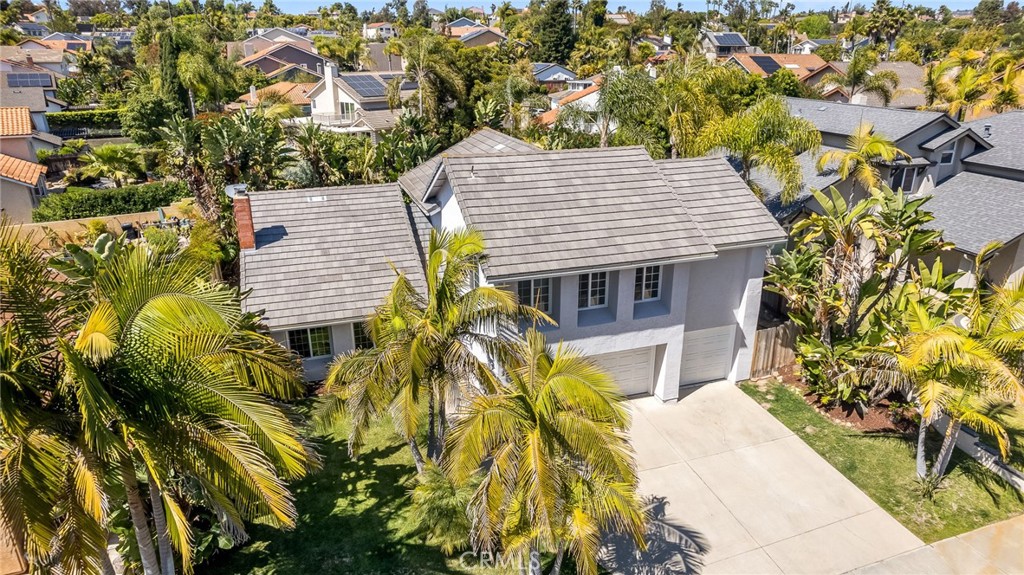 2204 Recodo Court Carlsbad, CA 92009 - Photo 42 of 44 view of a house with a yard