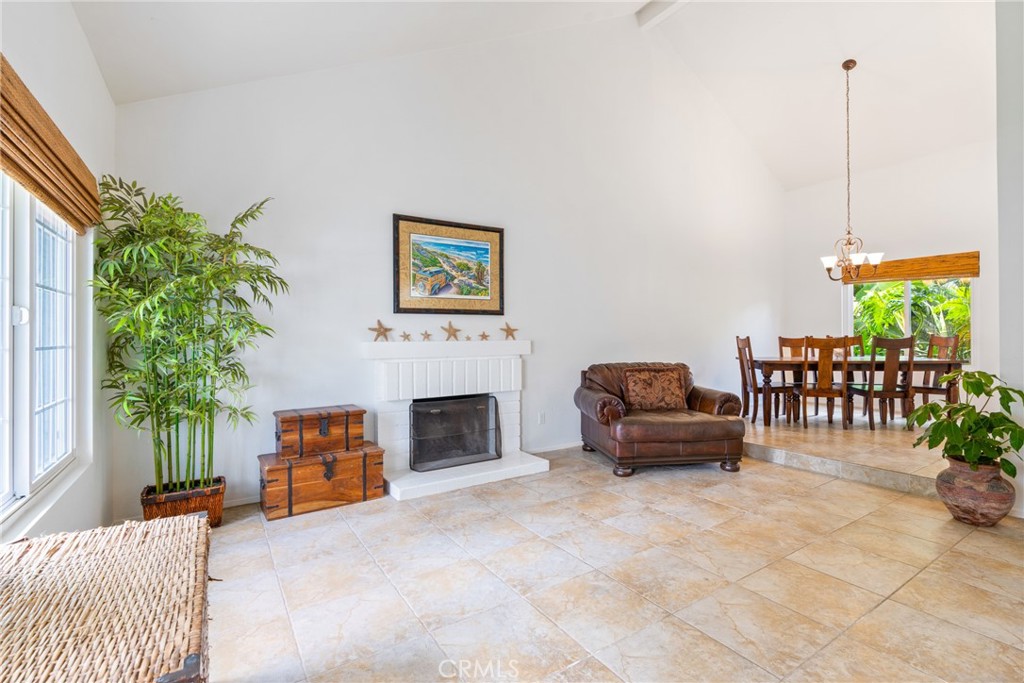 2204 Recodo Court Carlsbad, CA 92009 - Photo 6 of 44 a living room with furniture and a fireplace