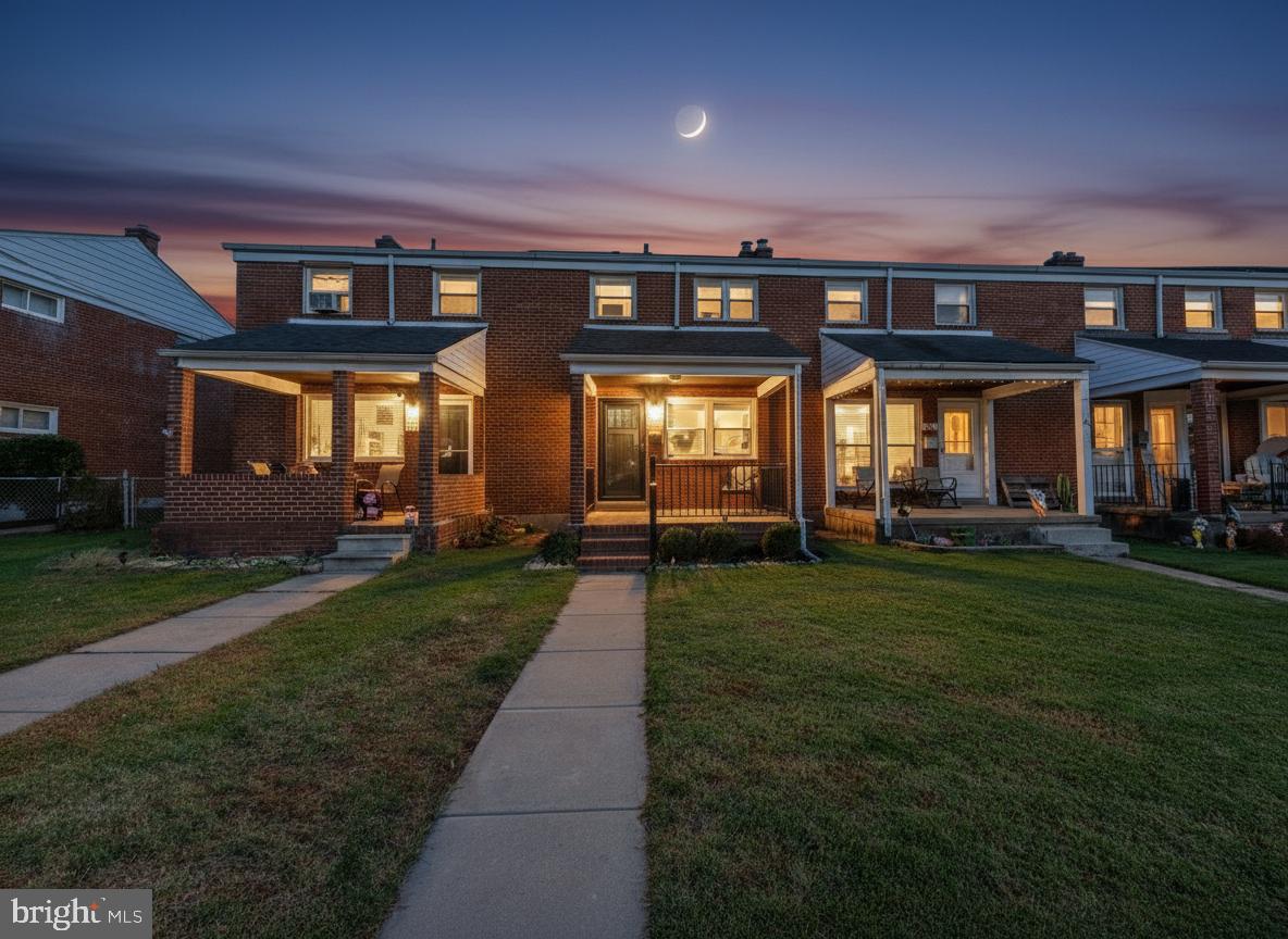 front view of a house with a yard