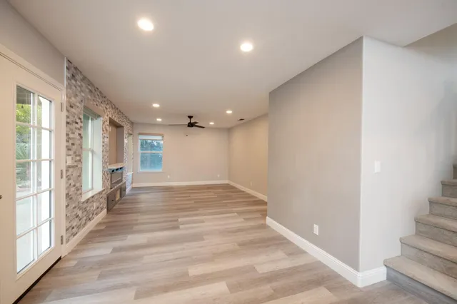 a view of entryway with wooden floor
