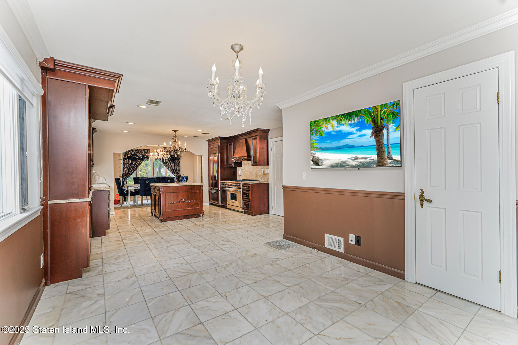 284 Todt Hill Road Staten Island, NY 10314 - Photo 12 of 29 a living room with furniture and a flat screen tv