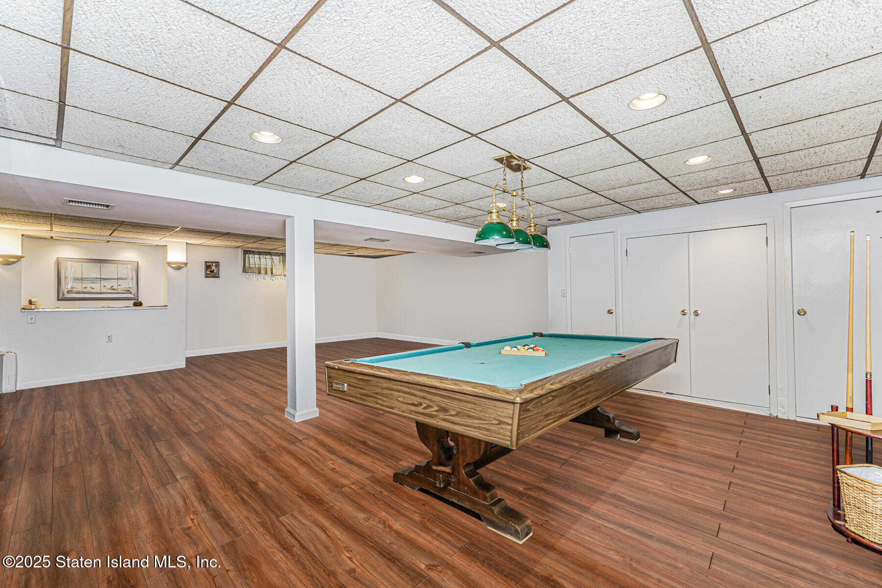 284 Todt Hill Road Staten Island, NY 10314 - Photo 26 of 29 a room with wooden floor and pool table