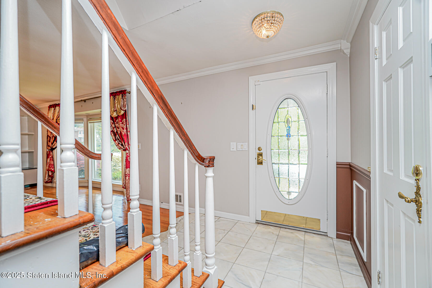284 Todt Hill Road Staten Island, NY 10314 - Photo 3 of 29 a view of an entryway with a garden