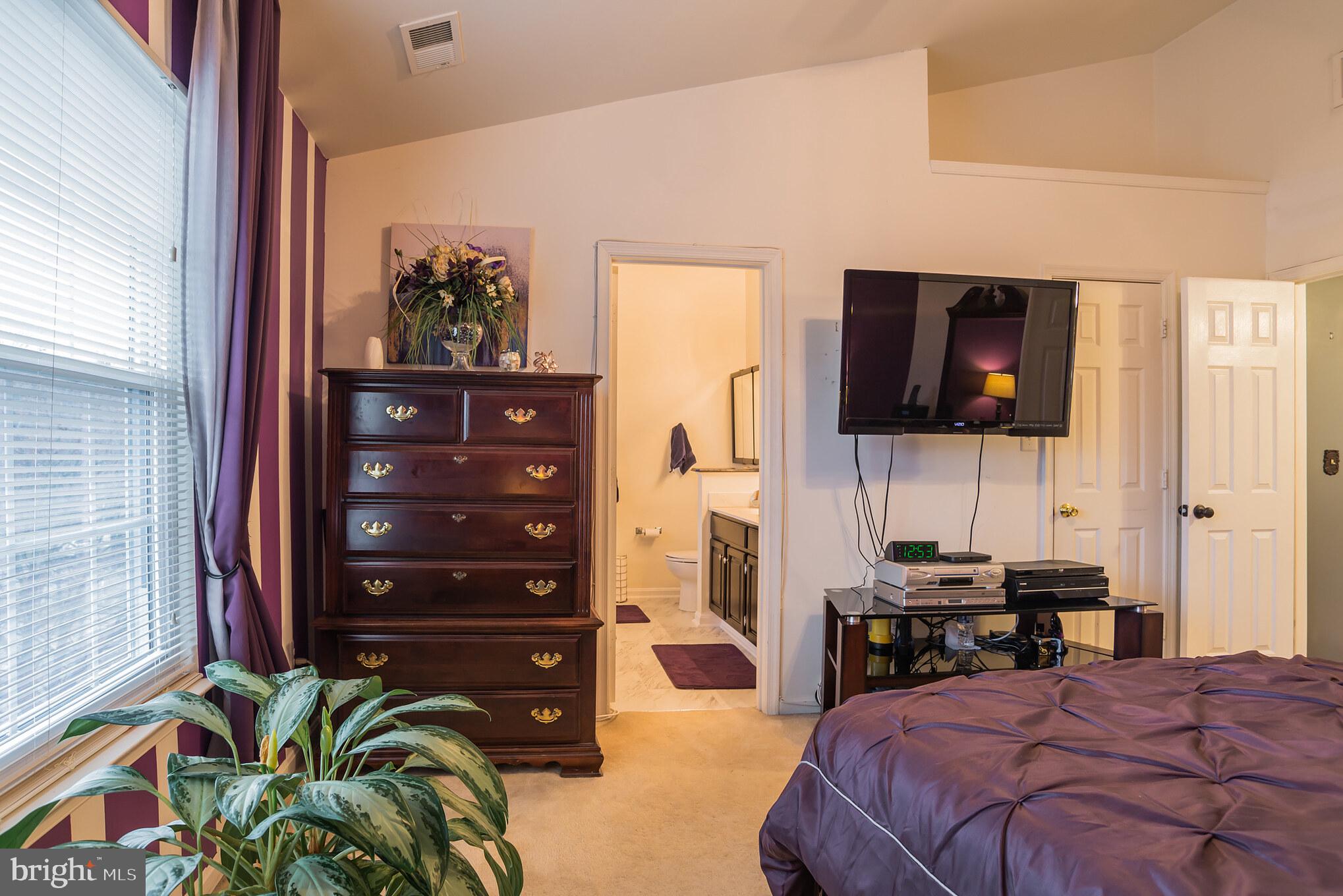 8609 Indian Springs Road Laurel, MD 20724 - Photo 14 of 30 Master bedroom with en-suite bath