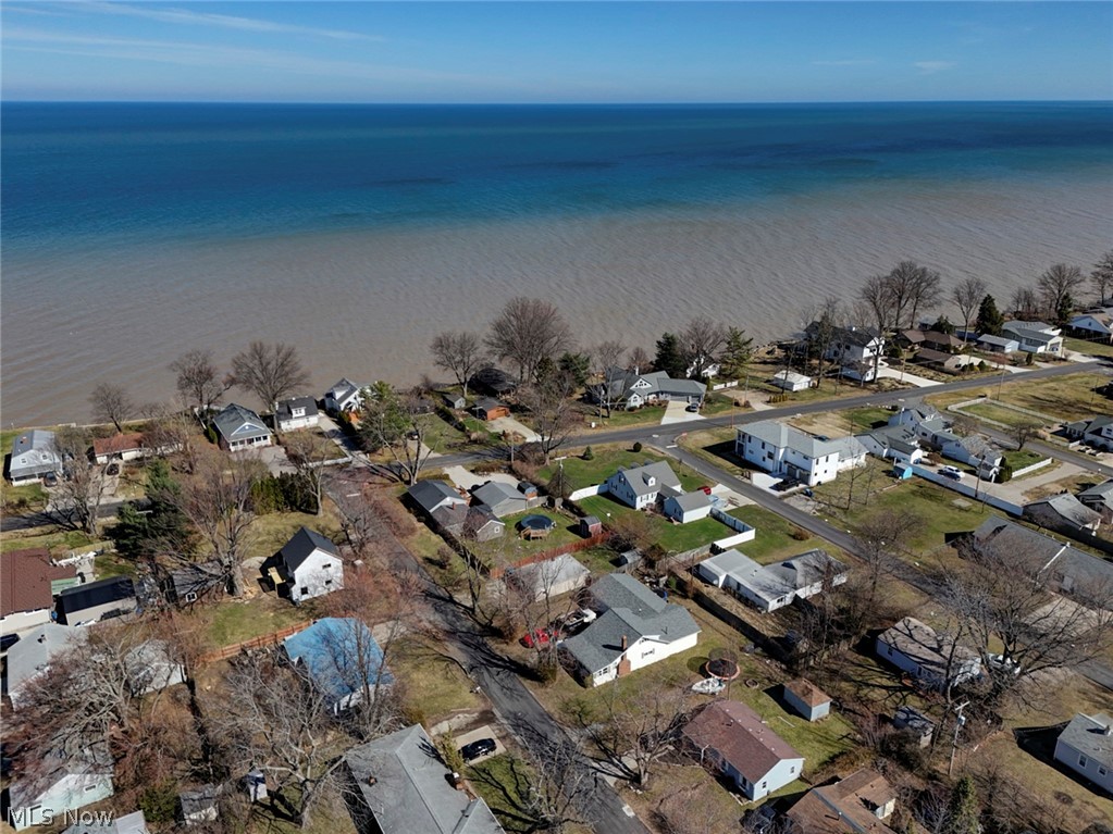 189 Harcourt Road Vermilion, OH 44089 - Photo 31 of 36 Aerial perspective of suburban area featuring a large body of water