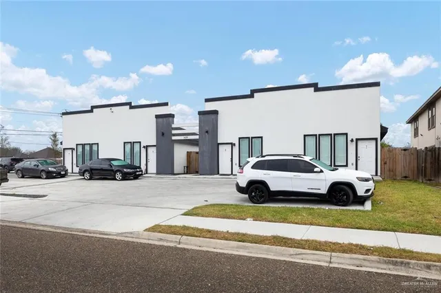 a car parked in front of a house