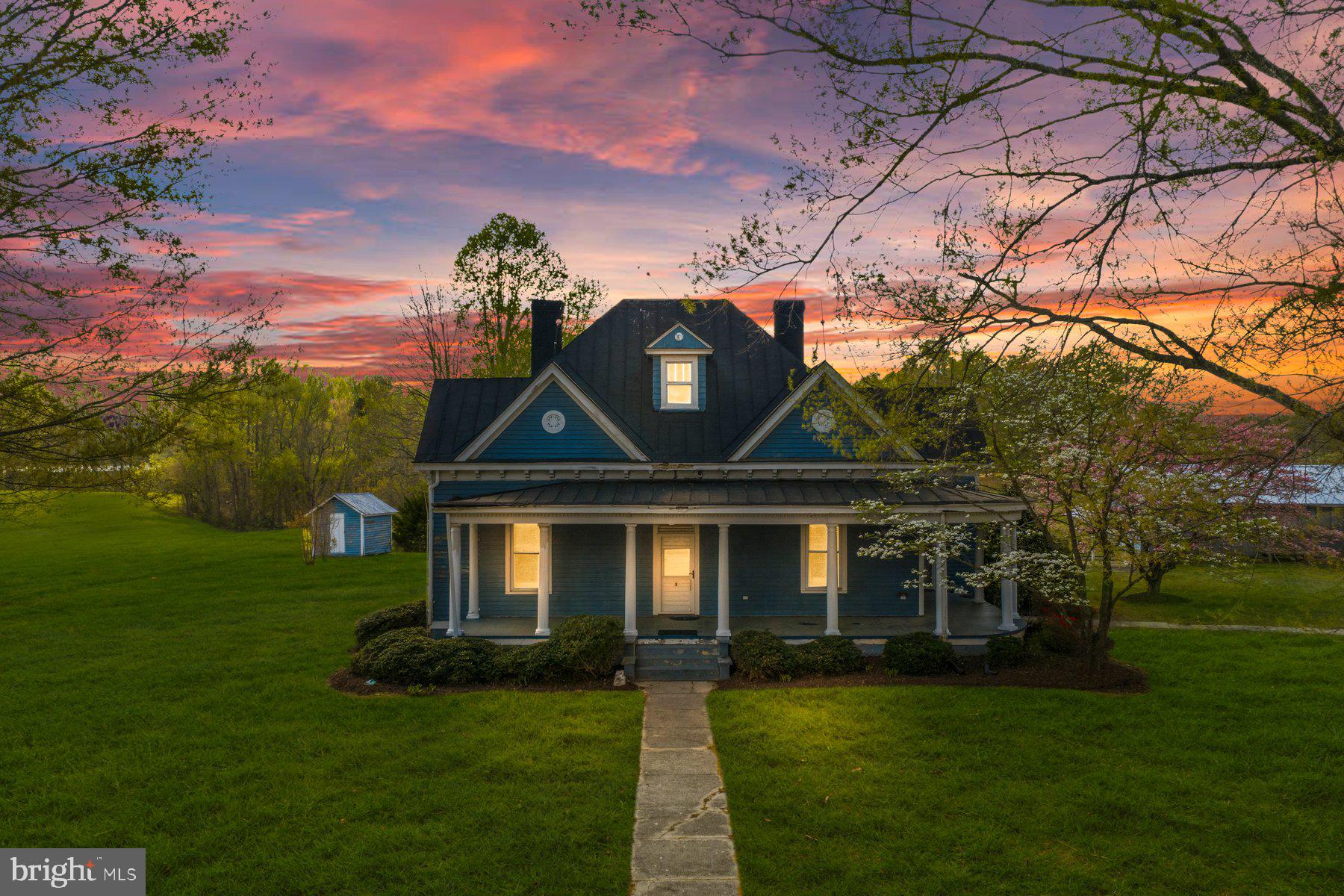 2136 Rocksprings Road Ringgold, VA 24586 - Photo 2 of 57 a front view of a house with garden
