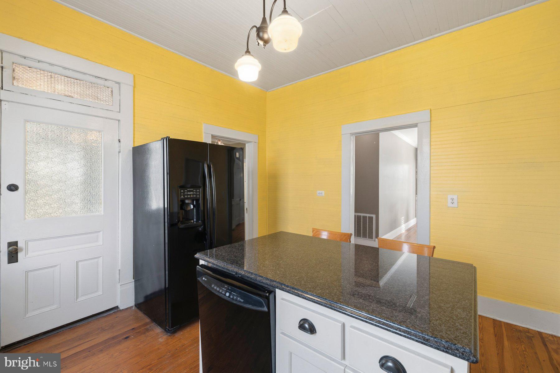 2136 Rocksprings Road Ringgold, VA 24586 - Photo 23 of 57 a view of a kitchen with a sink and refrigerator