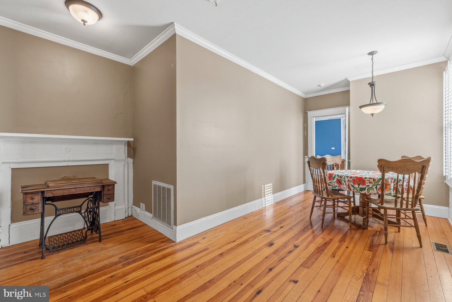 2136 Rocksprings Road Ringgold, VA 24586 - Photo 26 of 57 a view of a dining room with furniture and wooden floor