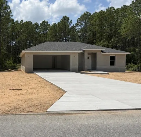 a house with trees in the background