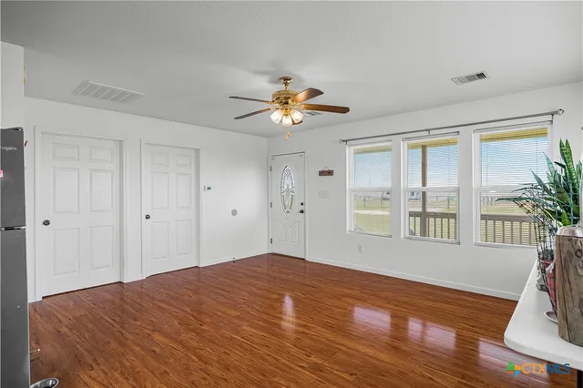 a kitchen with stainless steel appliances granite countertop a stove and a sink