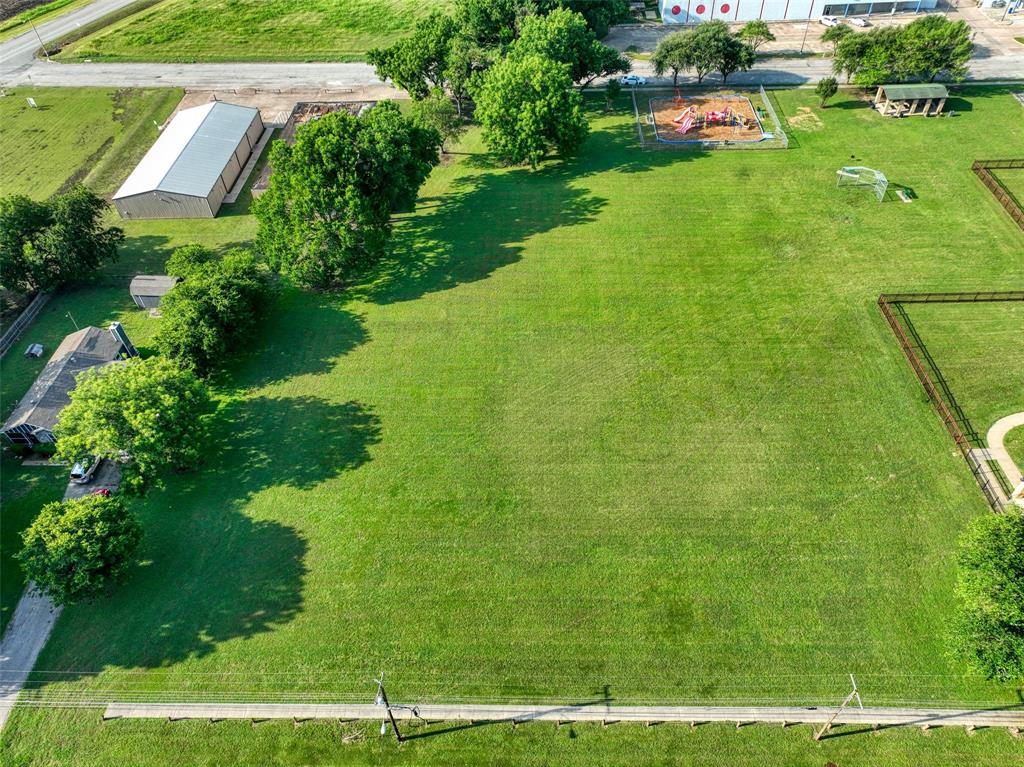 723 East Main Street Lancaster, TX 75146 - Photo 6 of 11 a view of a garden with a building