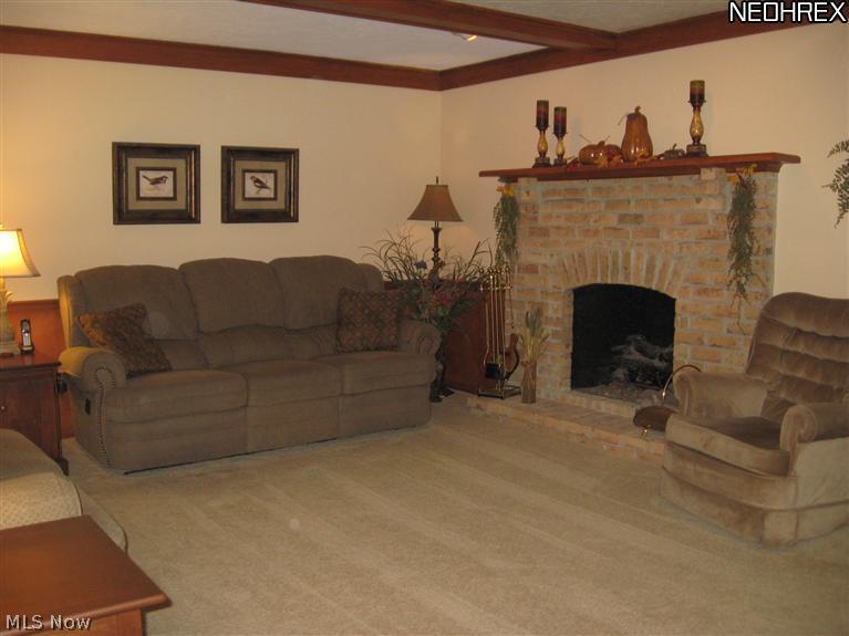 5313 Swepstone Street Northwest Canton, OH 44708 - Photo 9 of 25 Gas fireplace in great room