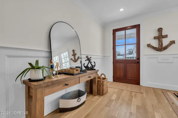 a living room with fireplace furniture and a flat screen tv