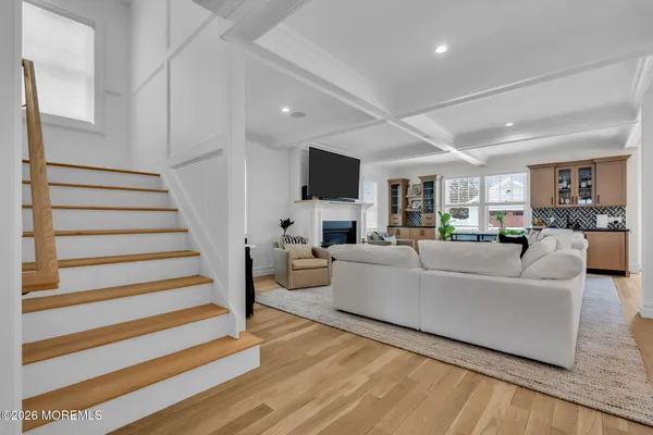 a living room with furniture and a table