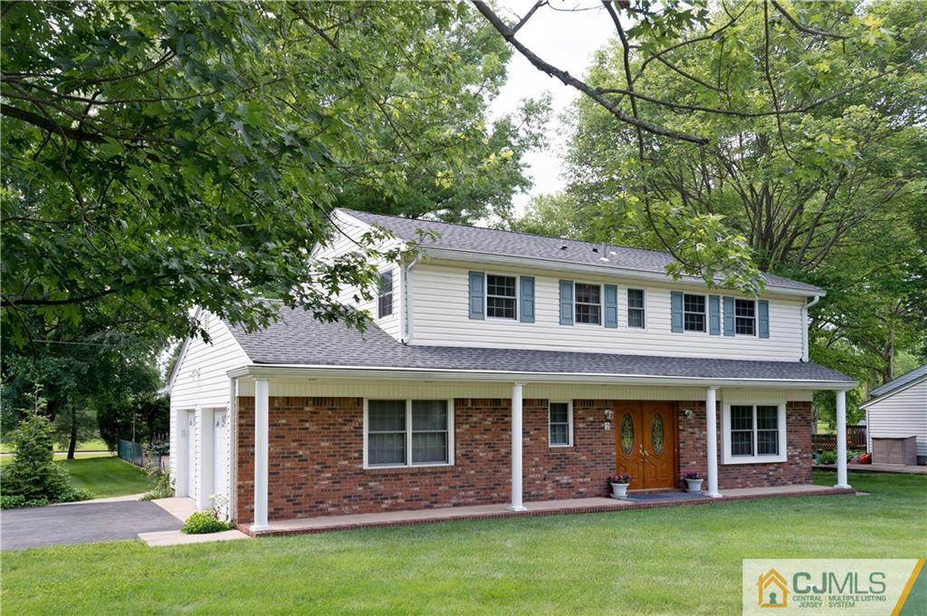 2 Doria Road Somerset, NJ 08873 - Photo 1 of 19 front view of a house with a yard