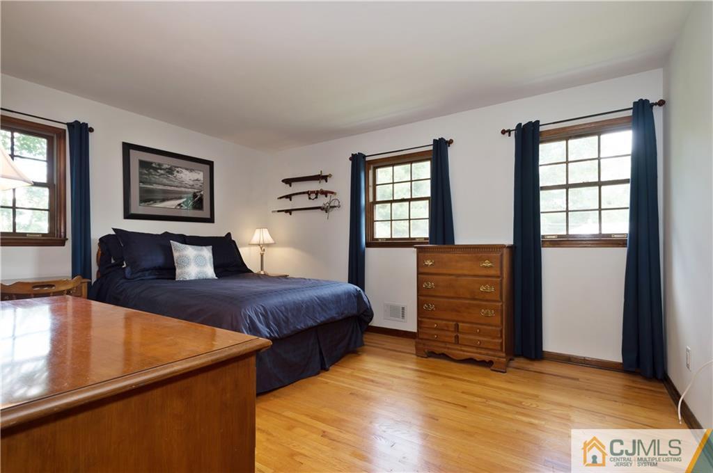 2 Doria Road Somerset, NJ 08873 - Photo 13 of 19 a bed room with a bed and a window