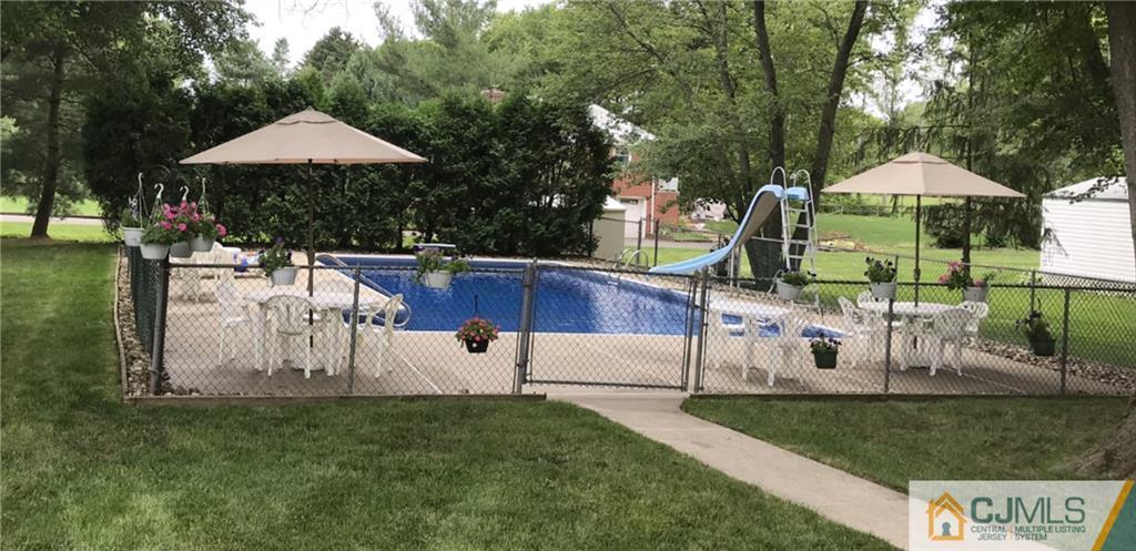2 Doria Road Somerset, NJ 08873 - Photo 17 of 19 a view of a house with backyard and sitting area