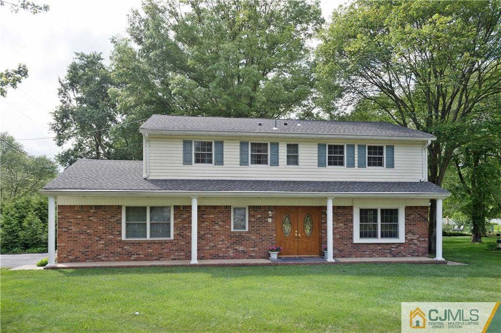 2 Doria Road Somerset, NJ 08873 - Photo 19 of 19 a front view of a house with a yard