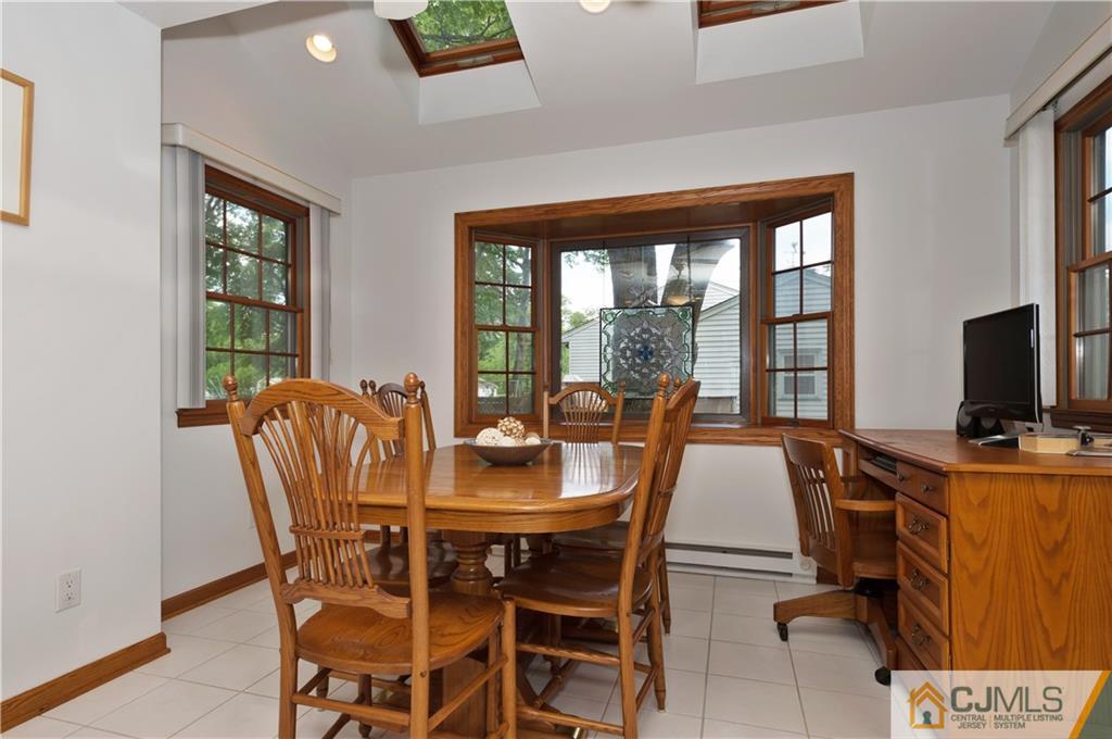 2 Doria Road Somerset, NJ 08873 - Photo 4 of 19 a view of a dining room with furniture window and outside view