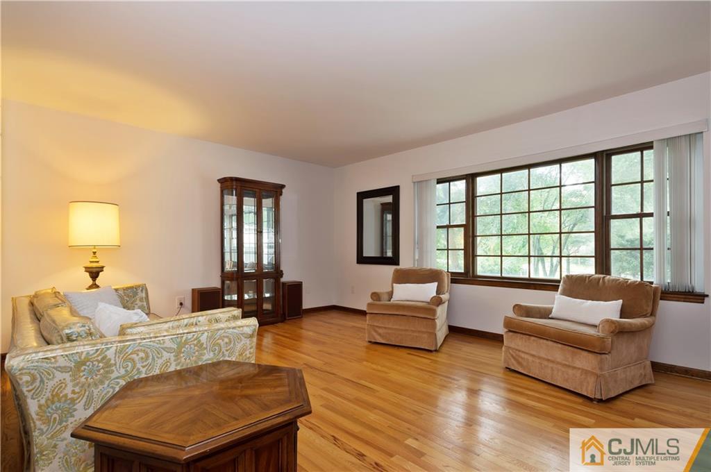 2 Doria Road Somerset, NJ 08873 - Photo 8 of 19 a living room with furniture and a large window