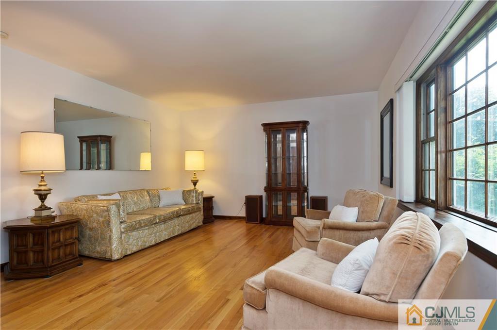 2 Doria Road Somerset, NJ 08873 - Photo 9 of 19 a living room with furniture and a large window