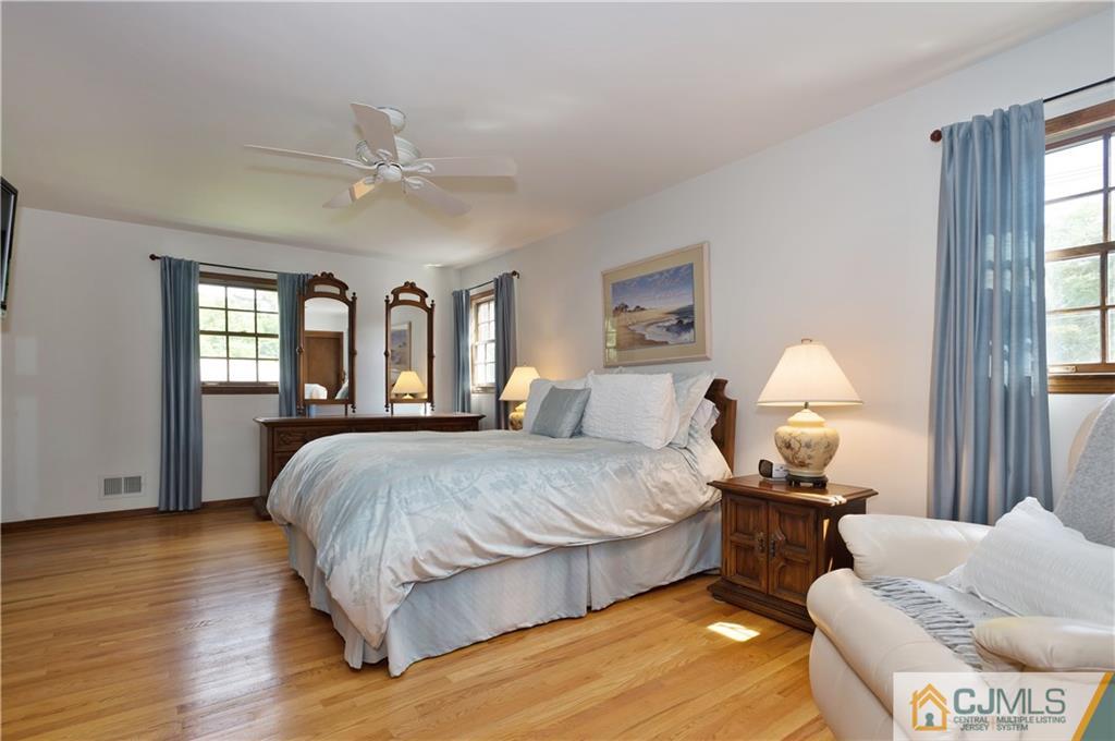 2 Doria Road Somerset, NJ 08873 - Photo 10 of 19 a spacious bedroom with a bed and window