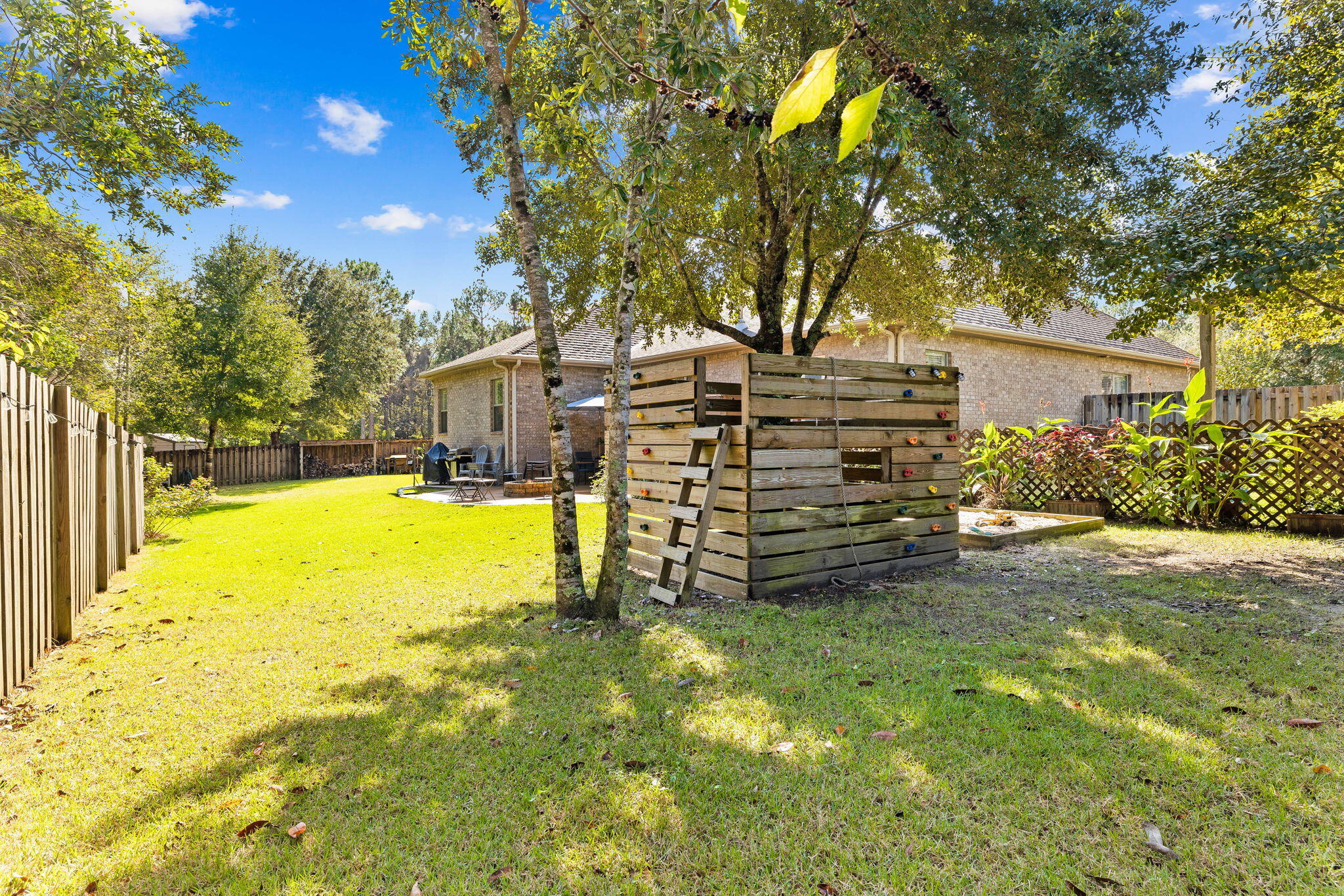 59 Echo Cove Freeport, FL 32439 - Photo 23 of 32 a view of a house with a big yard