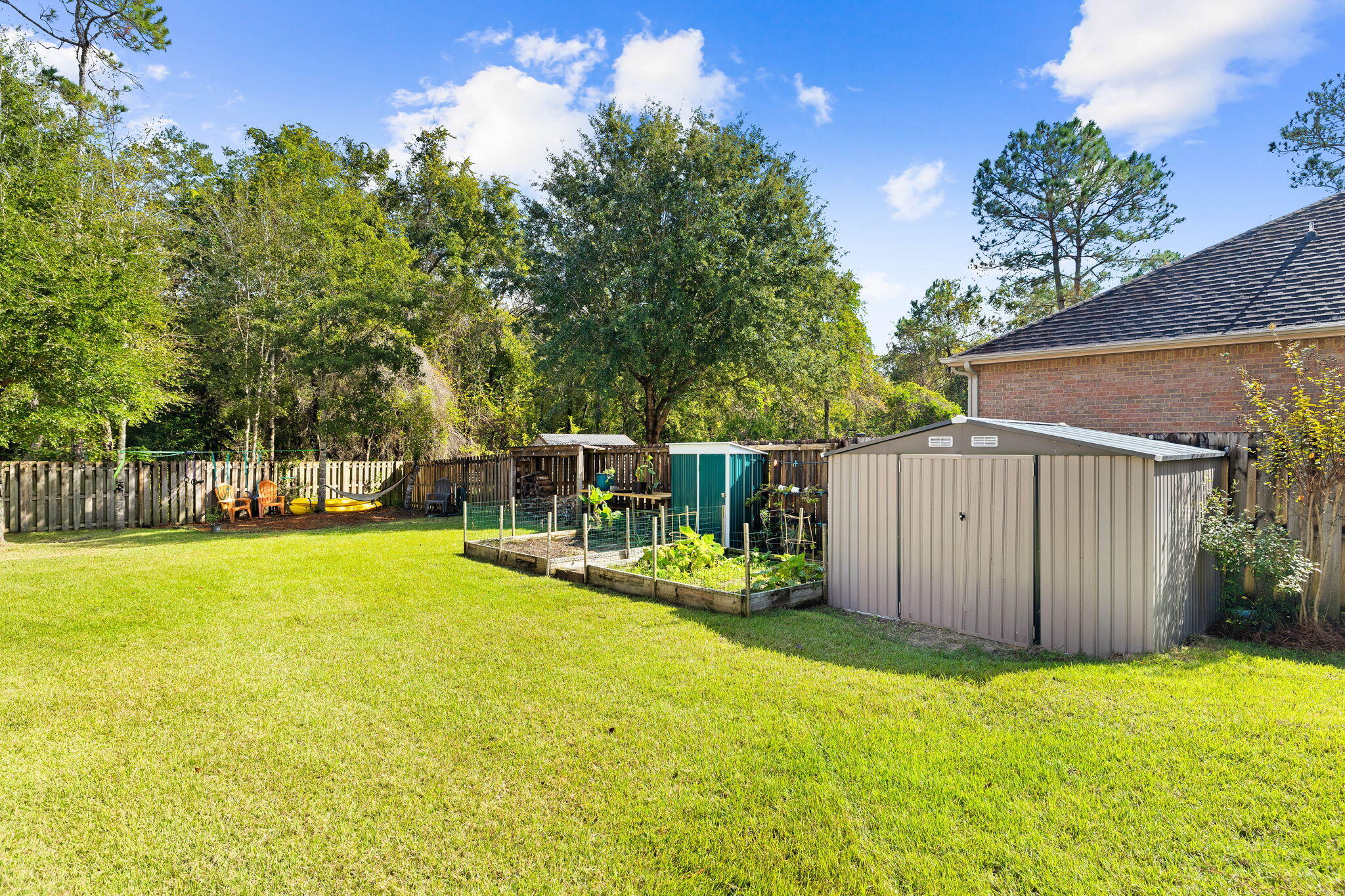 59 Echo Cove Freeport, FL 32439 - Photo 25 of 32 a view of a backyard with swimming pool