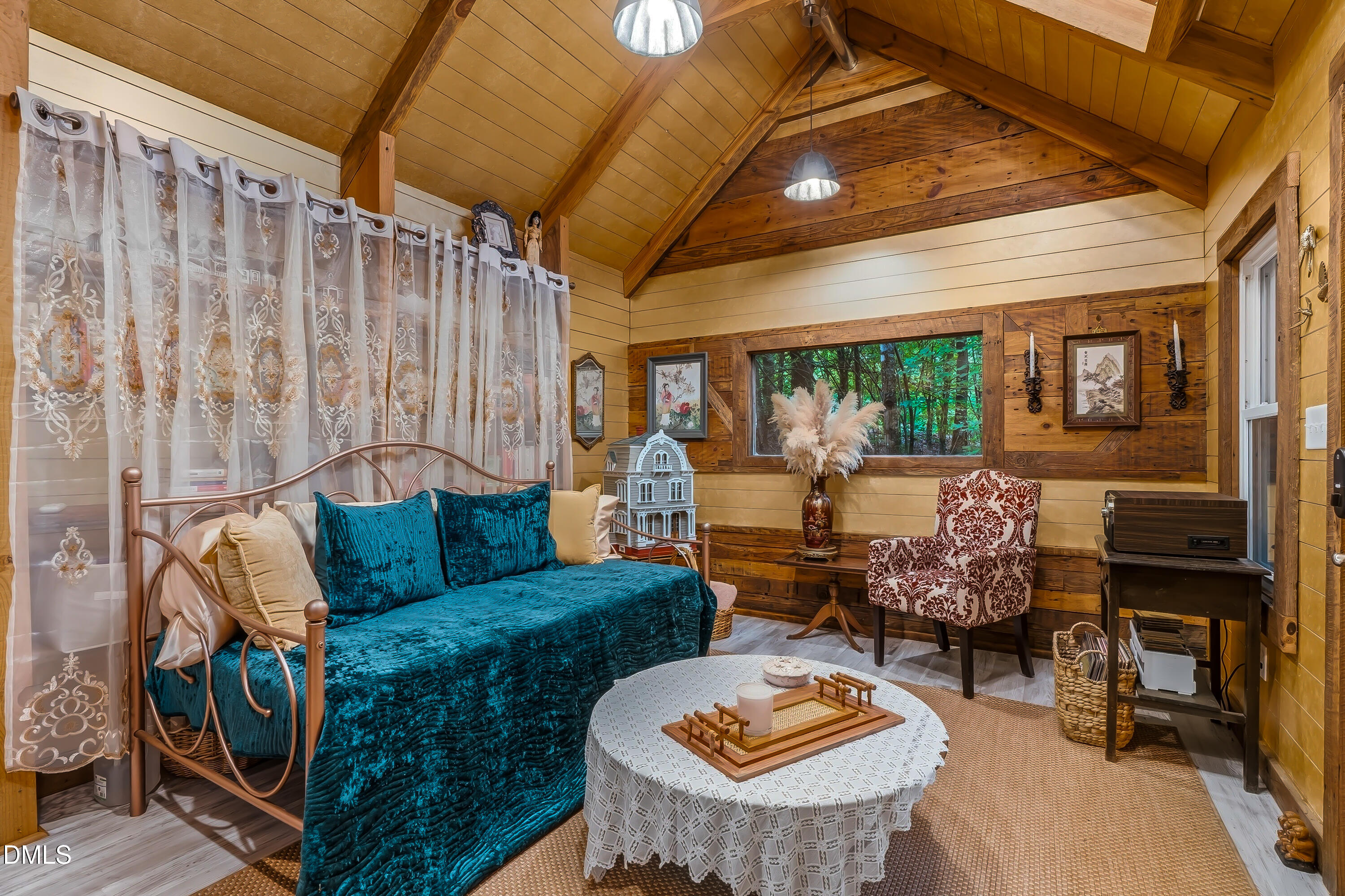1214 Halcyon Place Rougemont, NC 27572 - Photo 54 of 69 a living room with furniture and a fireplace