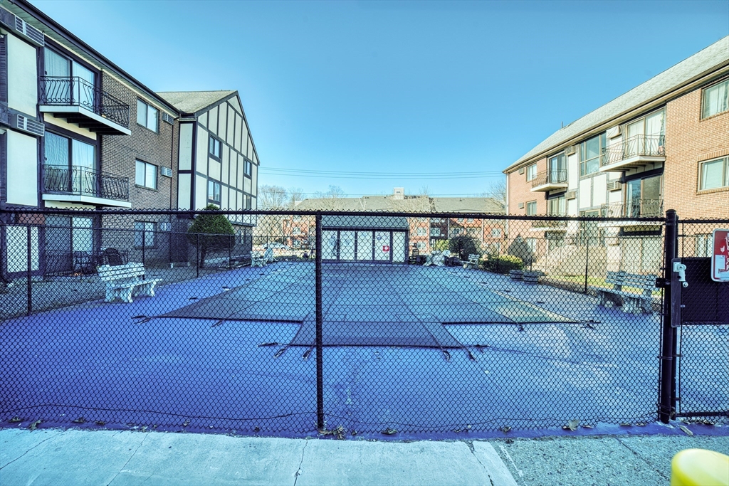 159 Bittersweet Lane, Unit 107 Randolph, MA 02368 - Photo 3 of 3 a view of an outdoor space with seating area