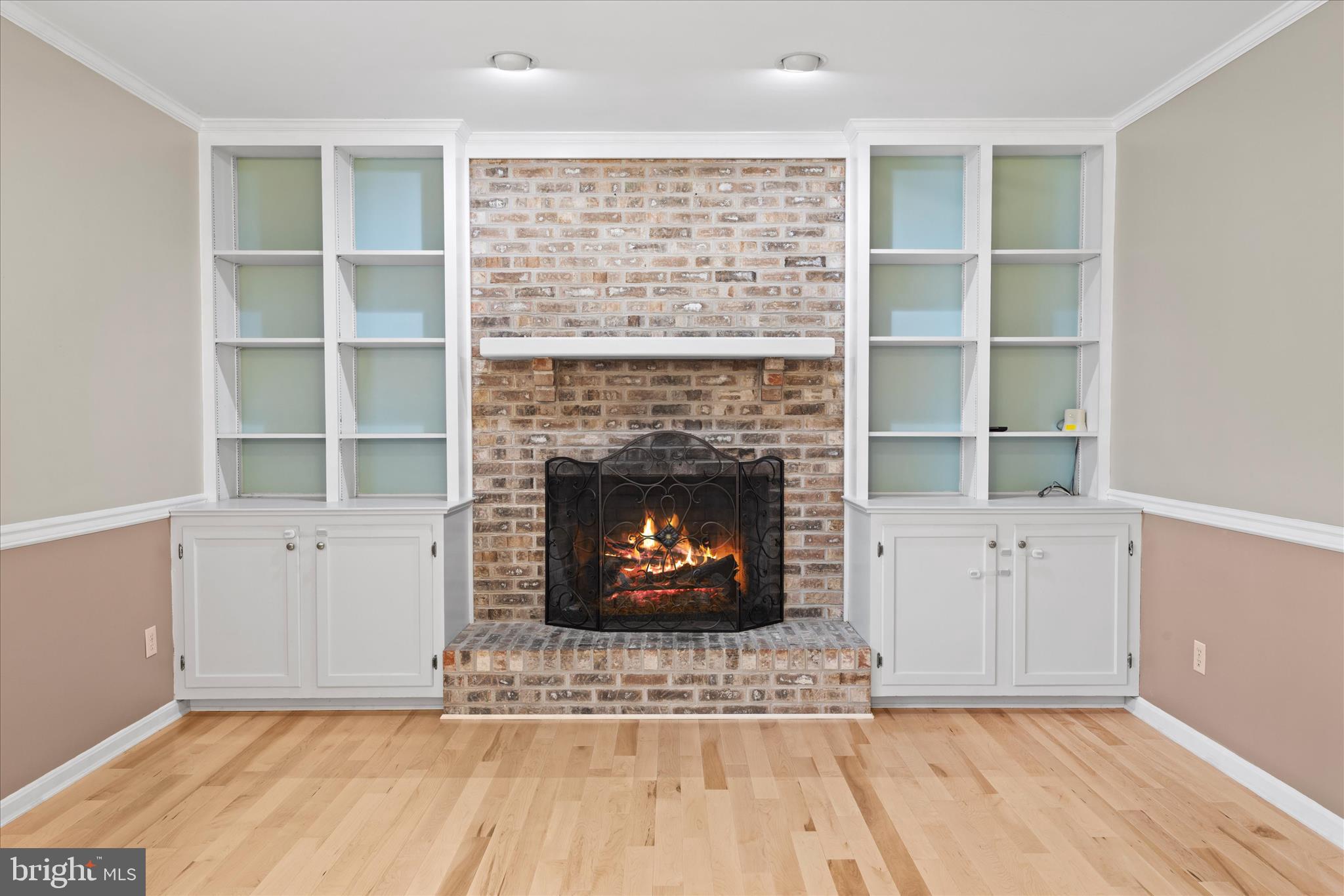 30398 Southampton Bridge Road Salisbury, MD 21804 - Photo 20 of 76 a living room with furniture a fireplace and a table