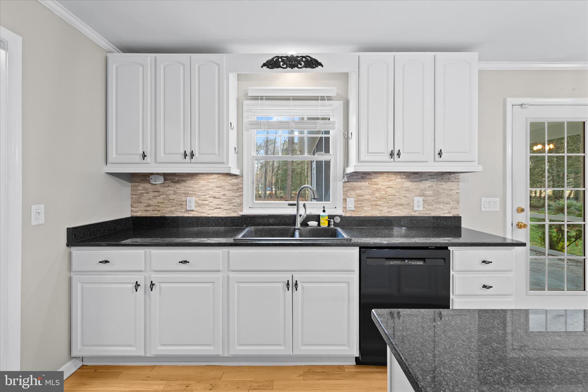 30398 Southampton Bridge Road Salisbury, MD 21804 - Photo 28 of 76 a kitchen with granite countertop white cabinets and a stove