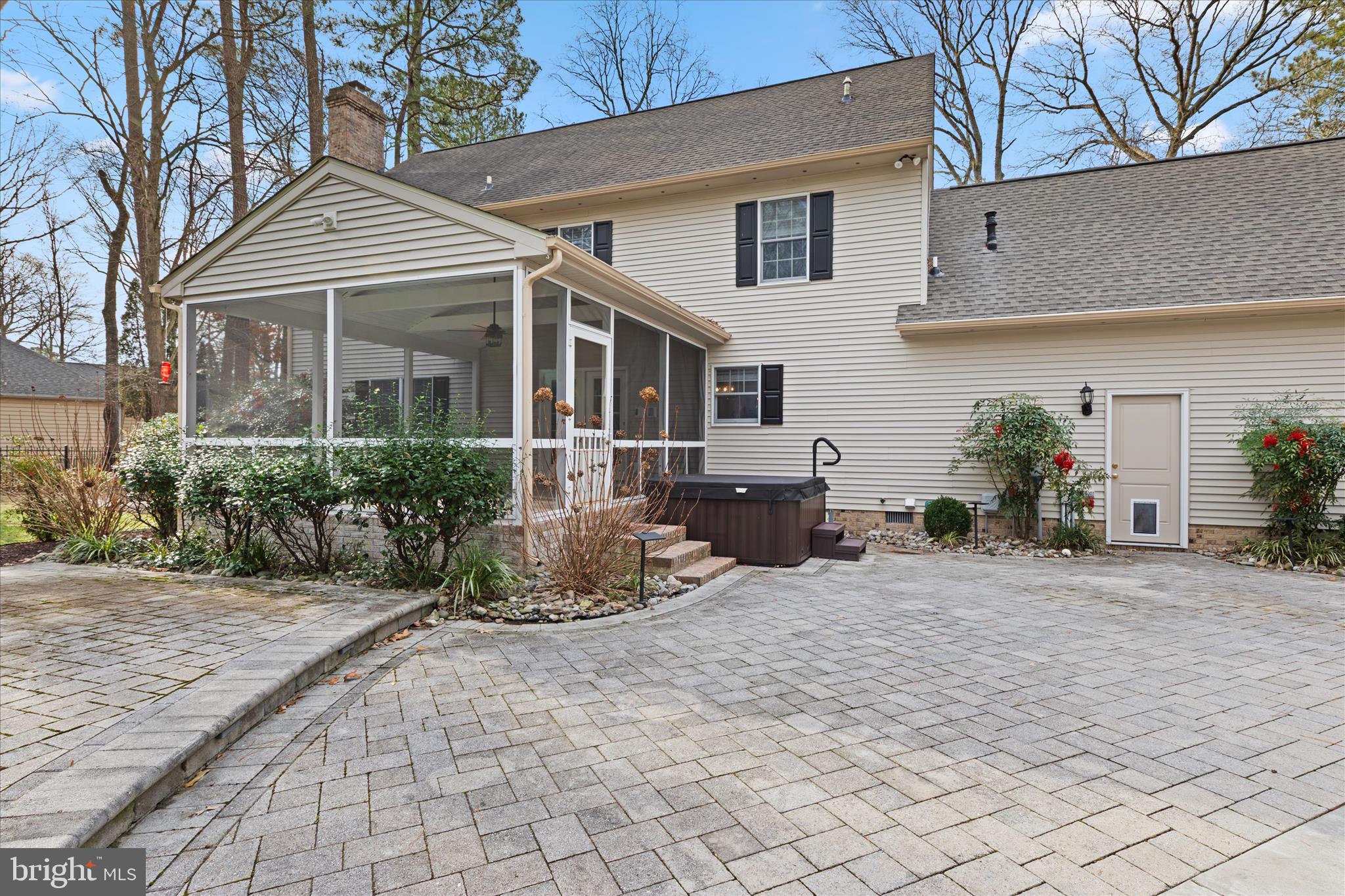 30398 Southampton Bridge Road Salisbury, MD 21804 - Photo 57 of 76 a front view of a house with a yard and potted plants