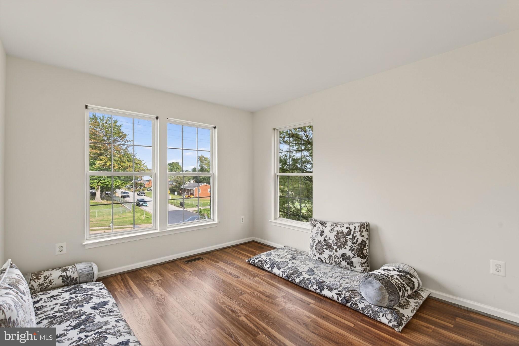 6903 Bock Road Fort Washington, MD 20744 - Photo 17 of 62 a living room with furniture and a window