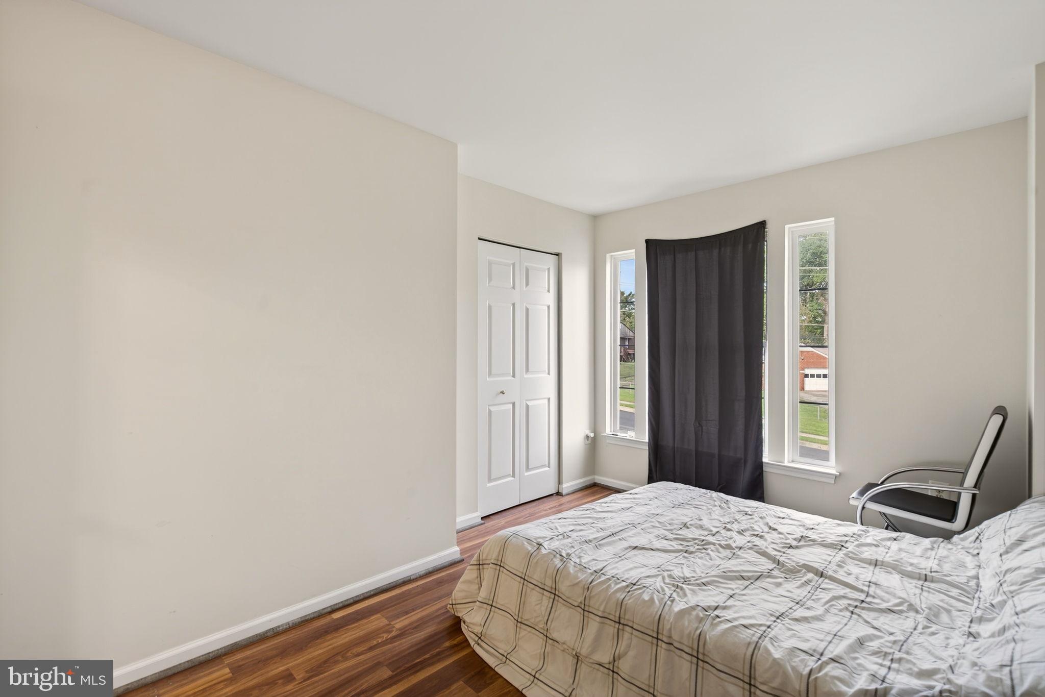 6903 Bock Road Fort Washington, MD 20744 - Photo 32 of 62 a bedroom with a bed and a window