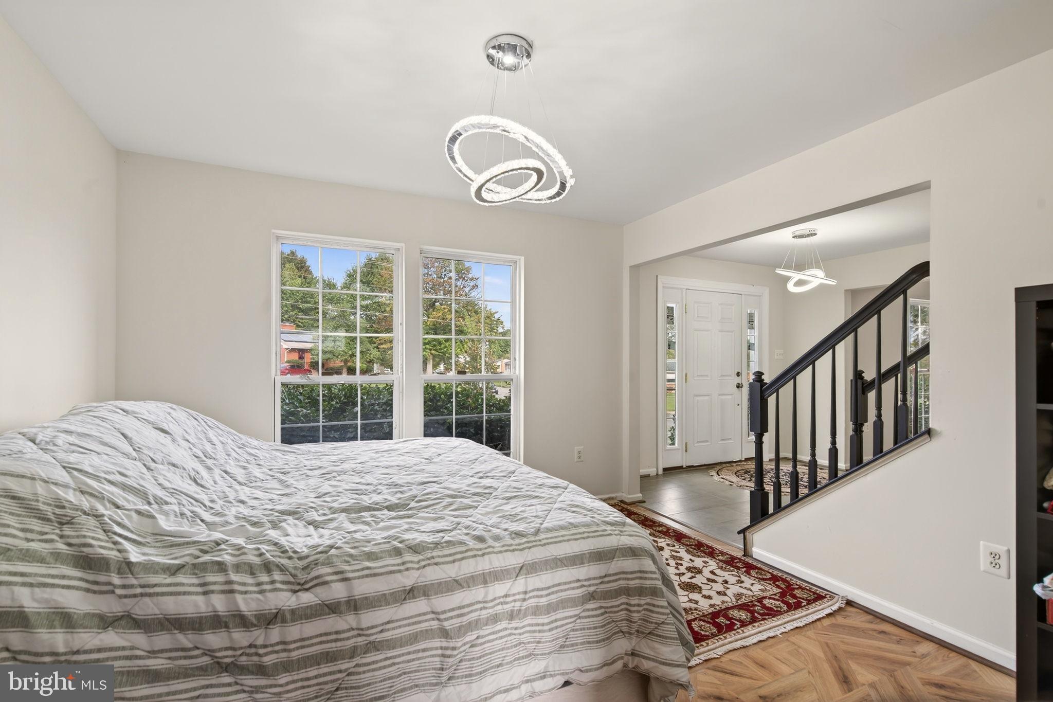 6903 Bock Road Fort Washington, MD 20744 - Photo 36 of 62 a bedroom with a bed and a window