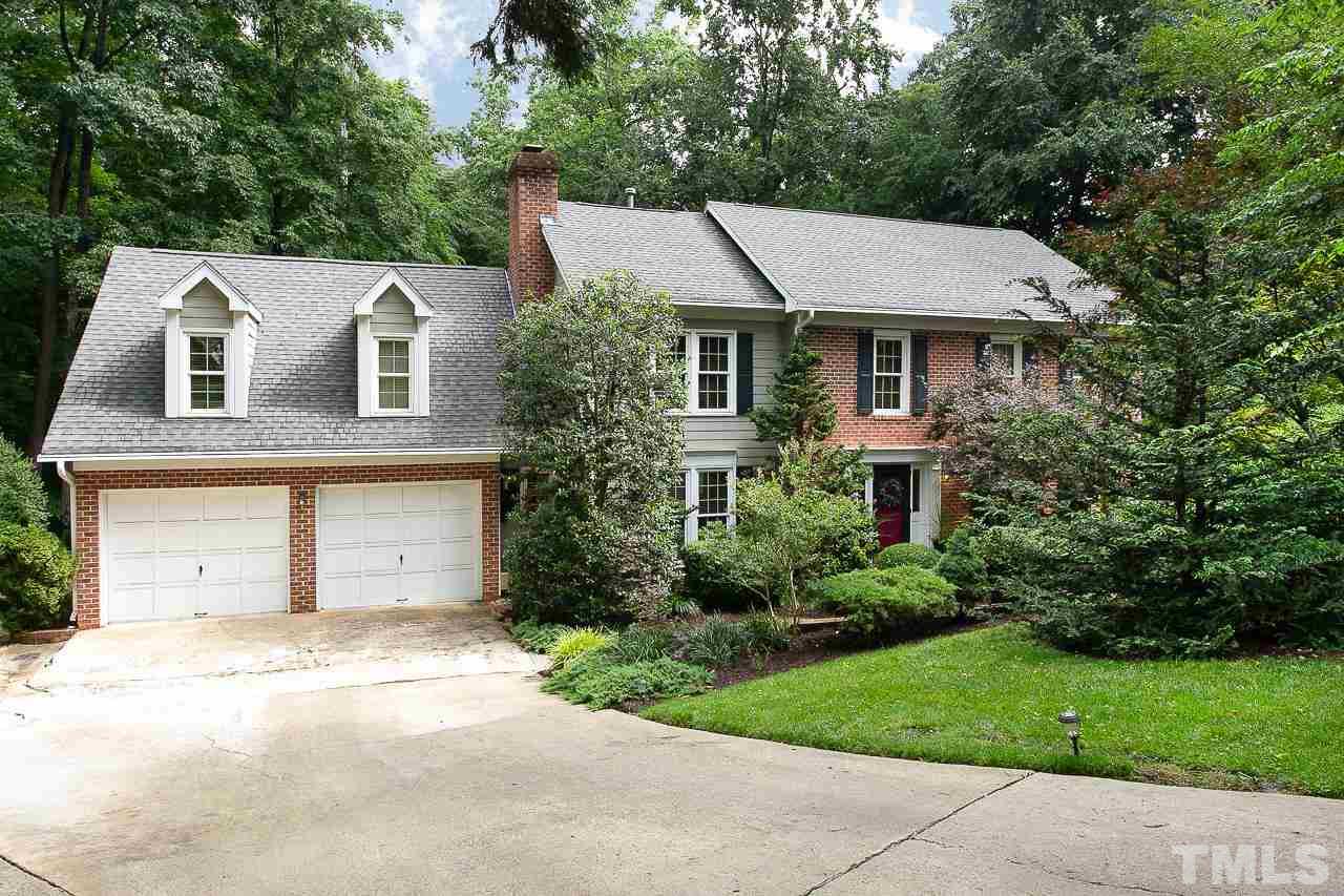 Enjoy the privacy of .72 acres in the middle of Cary!
