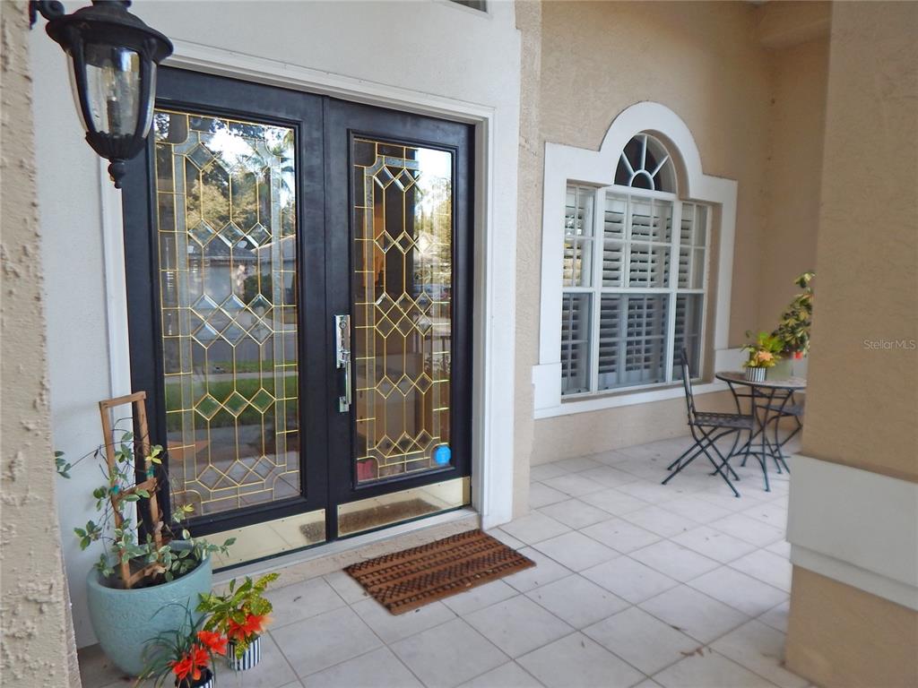 3603 Cypress Meadows Road Tampa, FL 33624 - Photo 3 of 33 a living room with furniture and a window