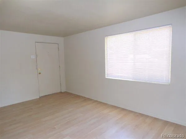 an empty room with a window