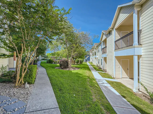 a view of a back yard of the house