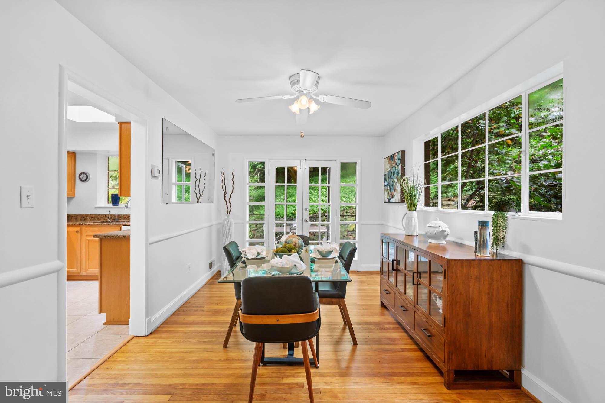 8008 Park Crest Drive Silver Spring, MD 20910 - Photo 19 of 42 a living room with furniture and a large window